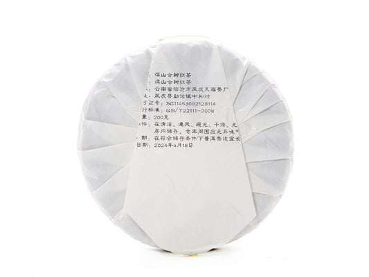 Ancient Tree Black Tea cake — back wrapper with production label