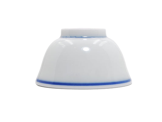 Inverted view of blue line porcelain teacup showing rim line and profile