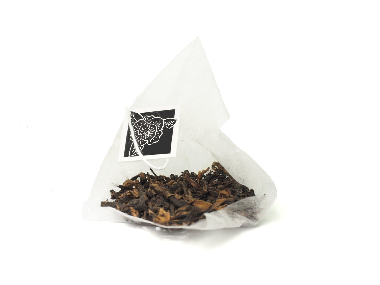 Loose leaves of premium whole black tea leaves in tea bags from Cha Zhi Ji