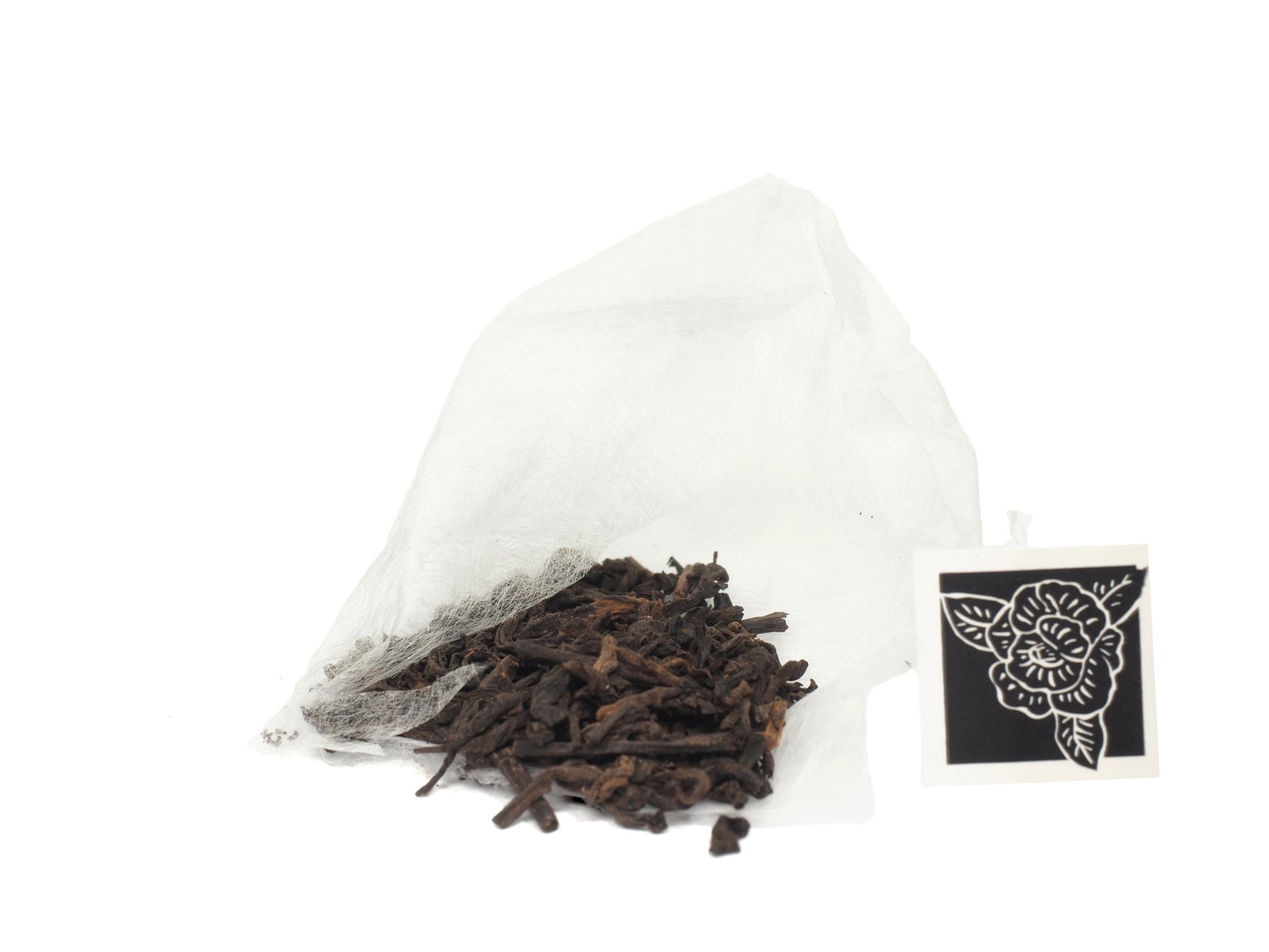 Loose leaves of premium Pu-Erh whole tea leaves in tea bags from Cha Zhi Ji