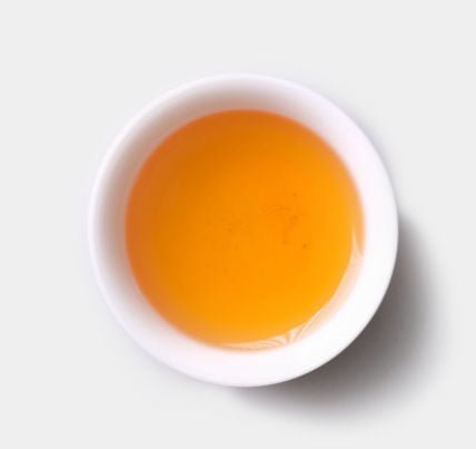 Tea soup of Yi Wu Zheng Shan Sheng Pu-Erh tea from 2008 by Cha Zhi Ji