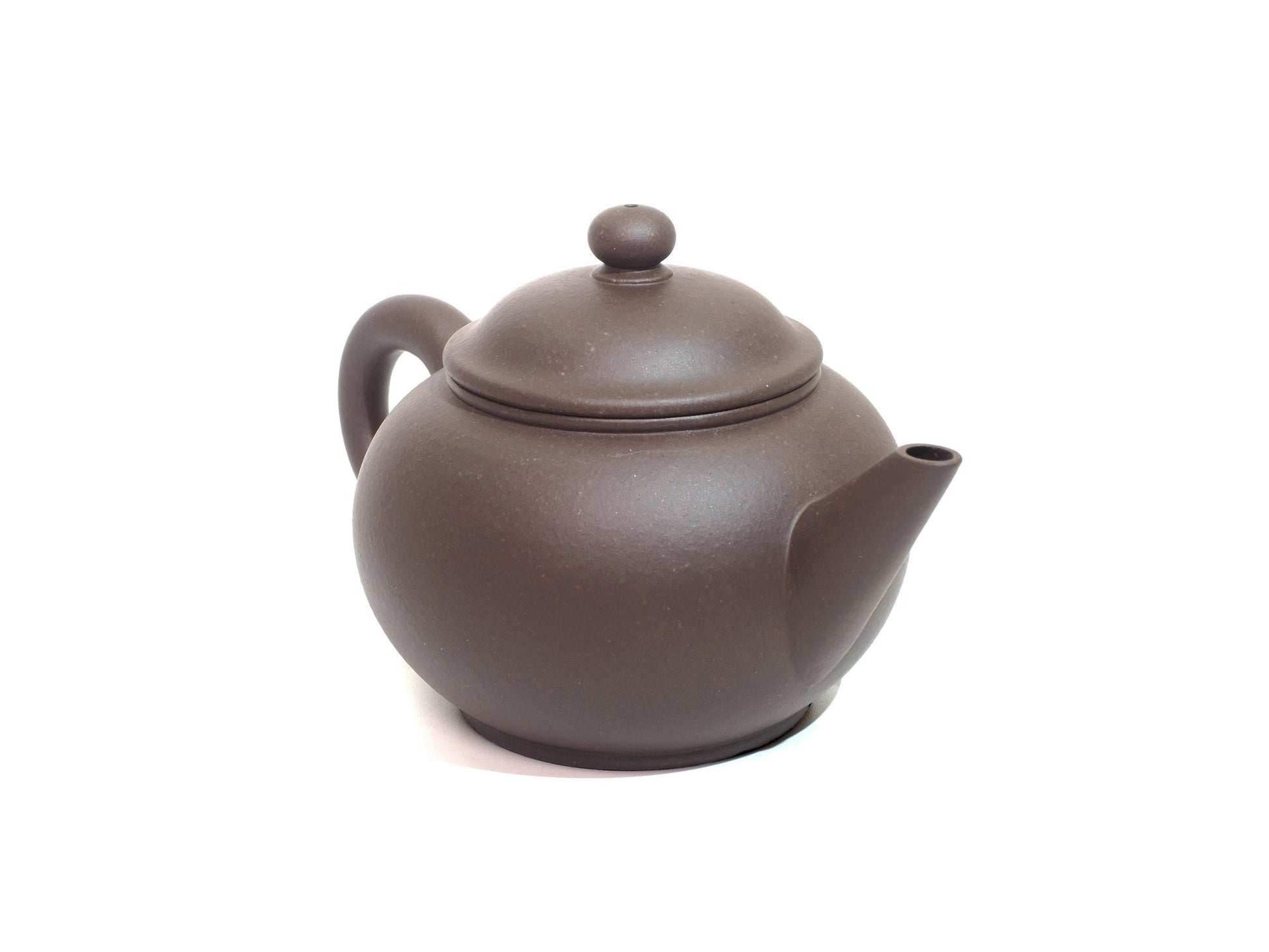220ml Shui Ping Yixing Teapot angled right view – highlighting spout and clay texture