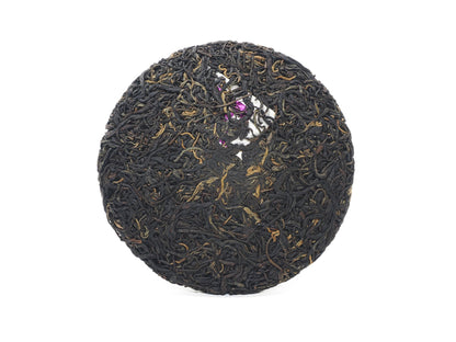 Unwrapped Dianhong cake front with embedded ticket (neifei)