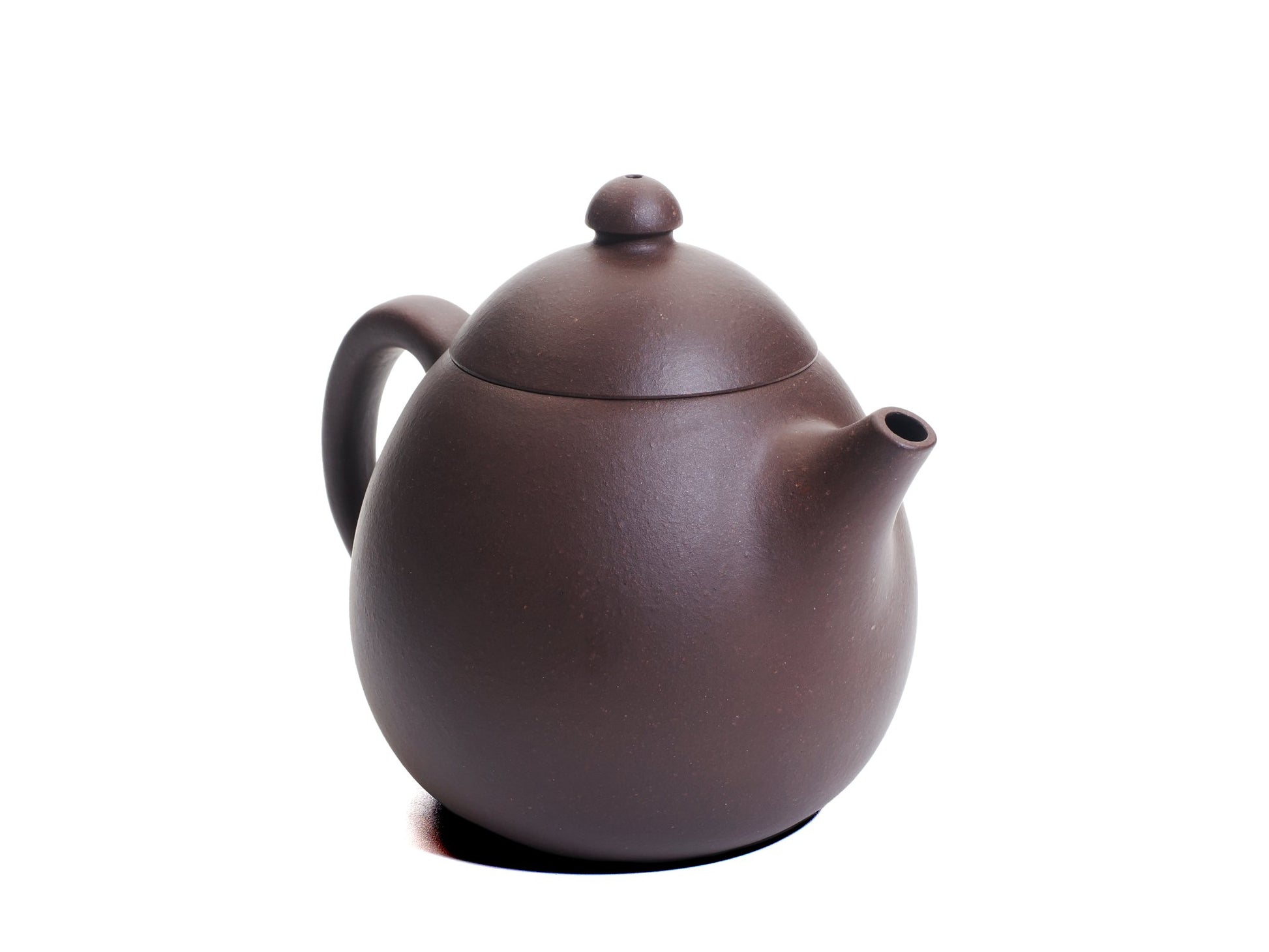 Angled front‑left view of the bronze grade Da Long Dan teapot with an egg‑shaped body, short curved spout and rounded handle.