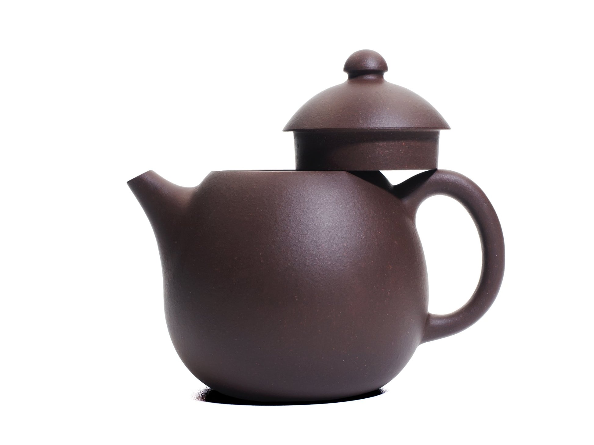 Side view of the Da Long Dan teapot with its lid removed and resting on the handle, revealing the wide opening of the 290 ml egg‑shaped pot.