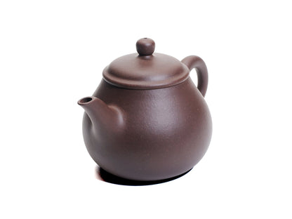Angled top view of the Da Ming Yuan Luo Han teapot showing the slender spout, domed lid and pear‑shaped body.