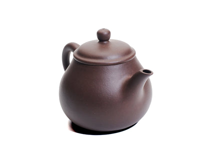 Another angled view of the Da Ming Yuan Luo Han teapot highlighting the spout, lid and handle.