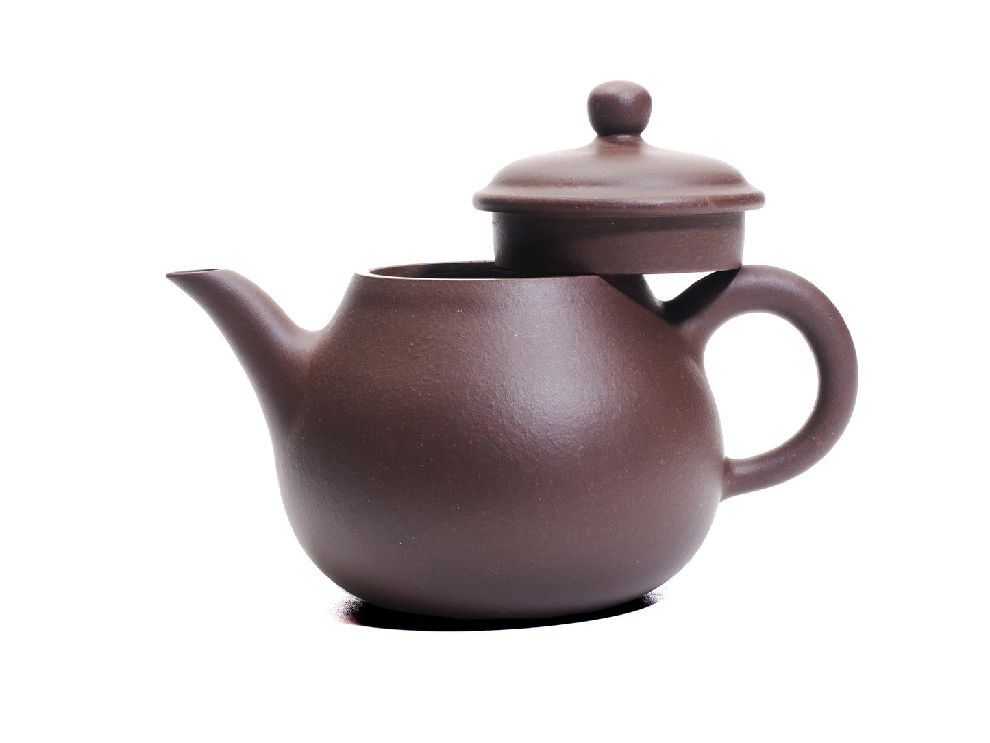 Da Ming Yuan Luo Han teapot with lid removed and resting on the handle, revealing the wide mouth and elegant profile.