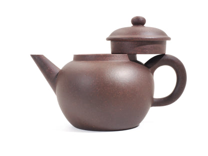 Jade Grade teapot with lid open, displaying the smooth, refined finish of the dark Zisha clay.