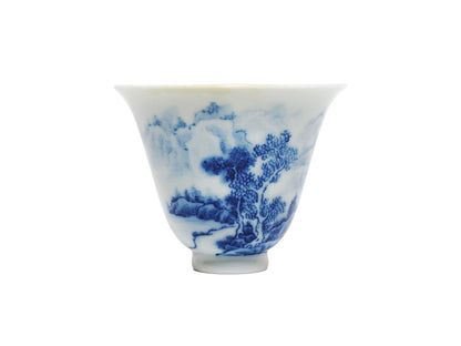Rear view showing pine trees and mountain brushwork on landscape teacup
