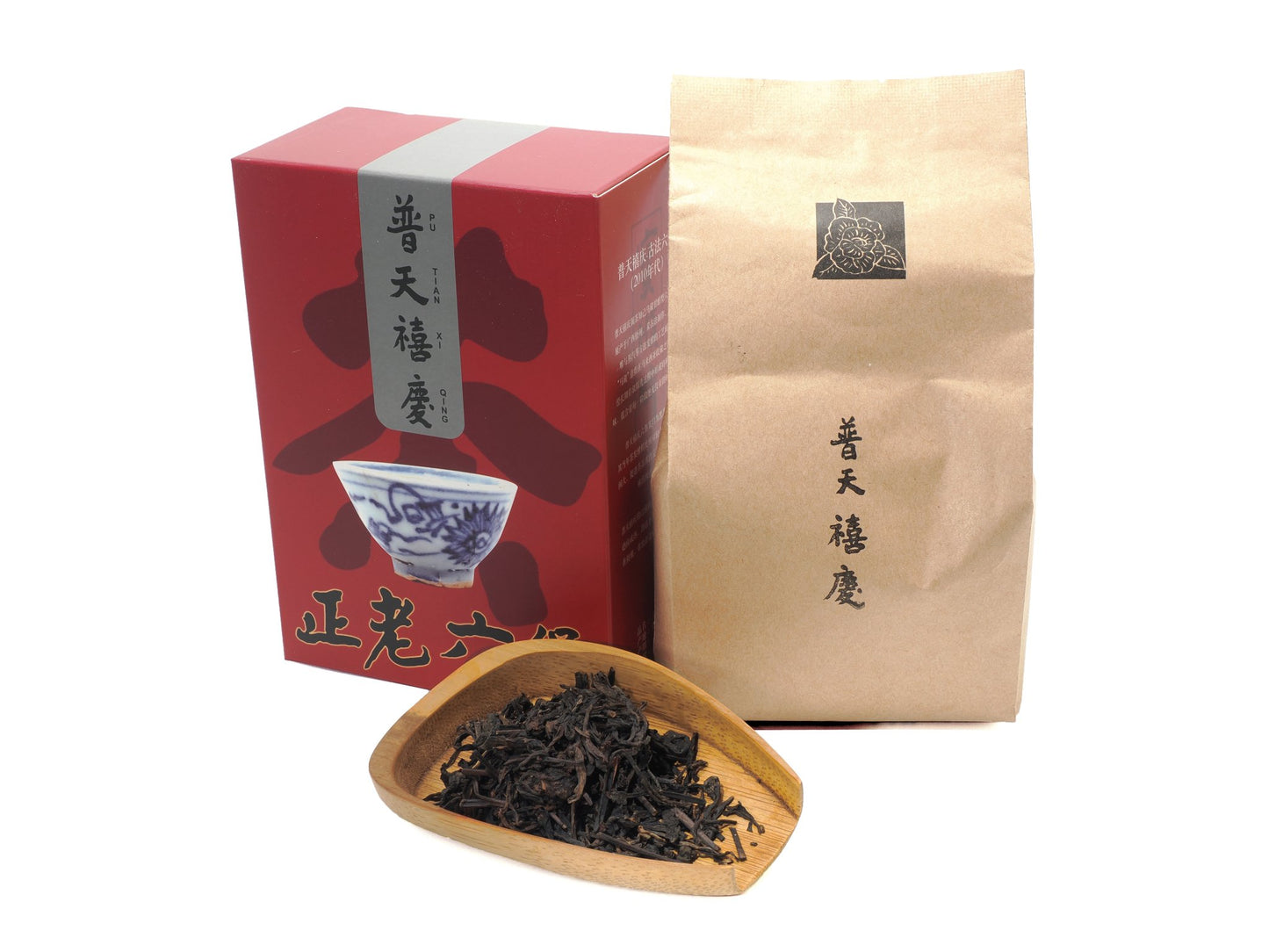 Jubilee Liu Bao tea — box, pouch and dry leaves on bamboo tray, traditionally processed, Malaysian aged