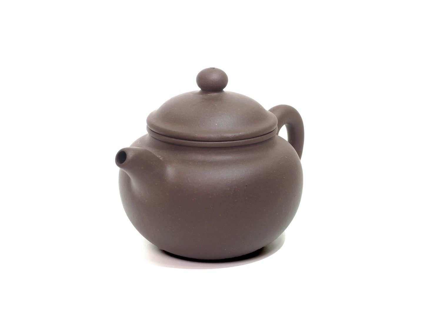 Angled front-left perspective of Lian Zi Yixing Teapot – smooth rounded profile
