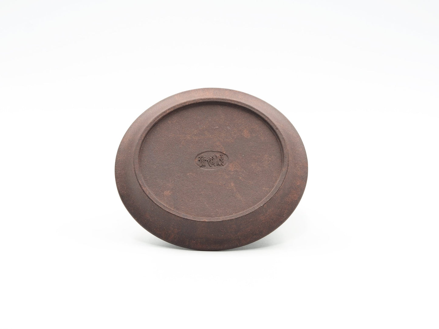 Bottom view of carved Yixing Tea Coaster in Bronze Grade clay with maker’s mark