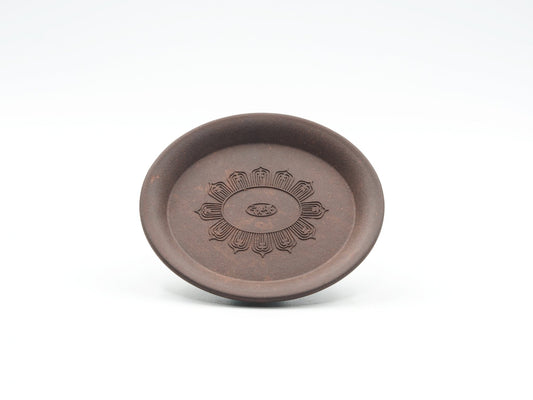 Front view of Oval Yixing Tea Coaster showing carved lotus flower design