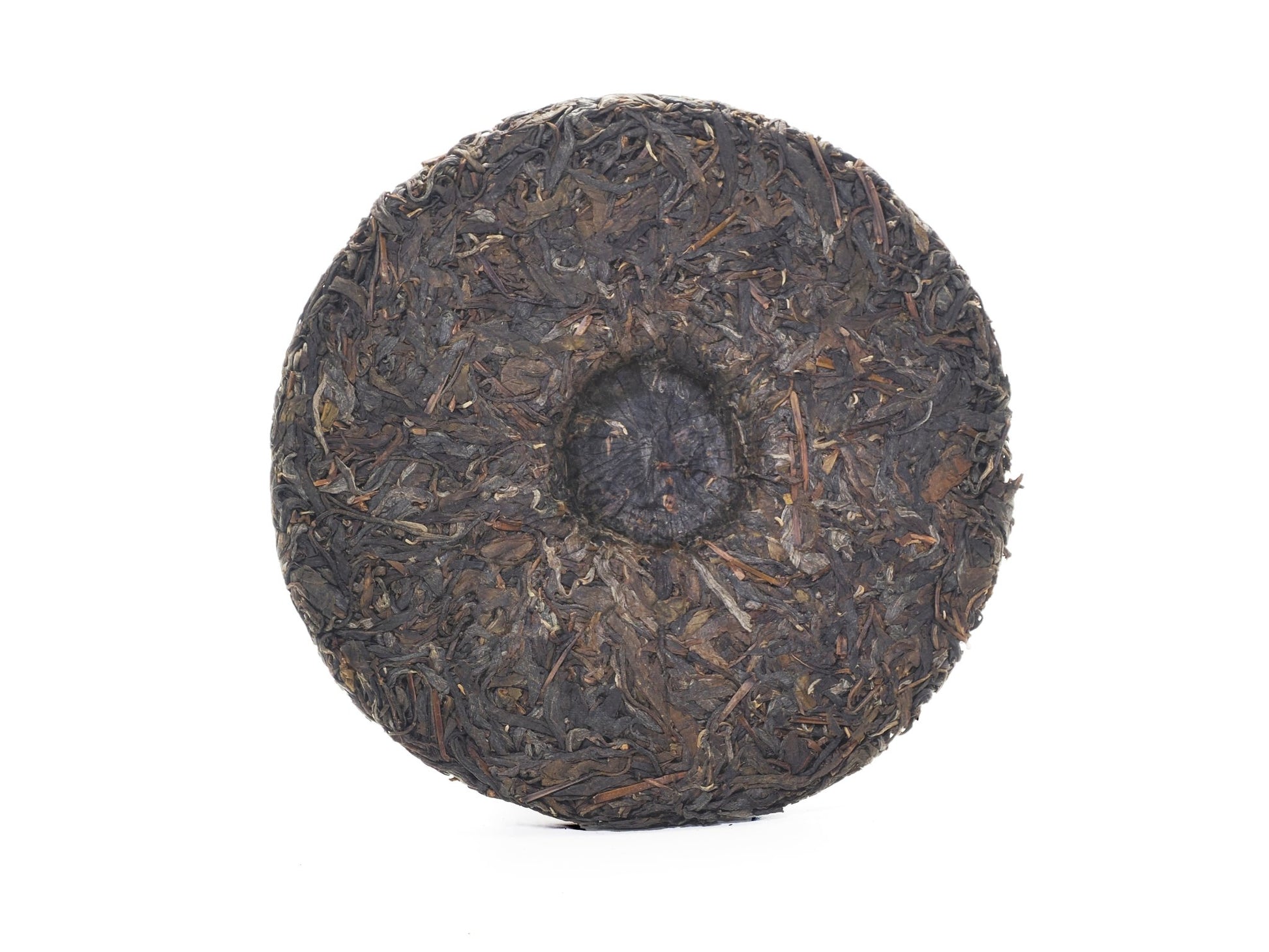 Unwrapped tea cake back showing center dimple
