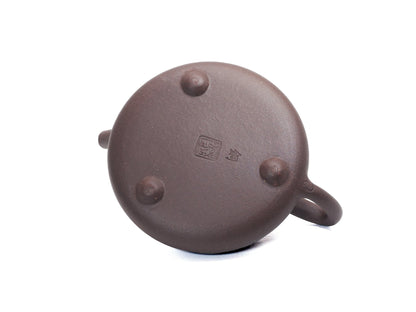 Base of teapot showing potter’s stamp