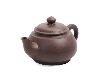 Angled left view of Wu Yun teapot with raised lid and sharp spout alignment