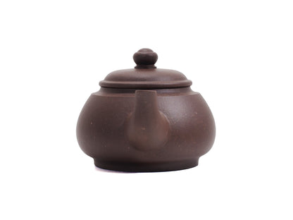 Front view of Wu Yun teapot highlighting short spout and compact design