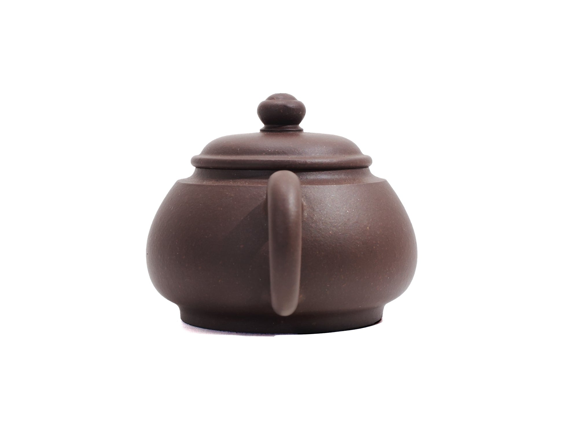 Back view of Wu Yun teapot showing round body and ergonomic handle