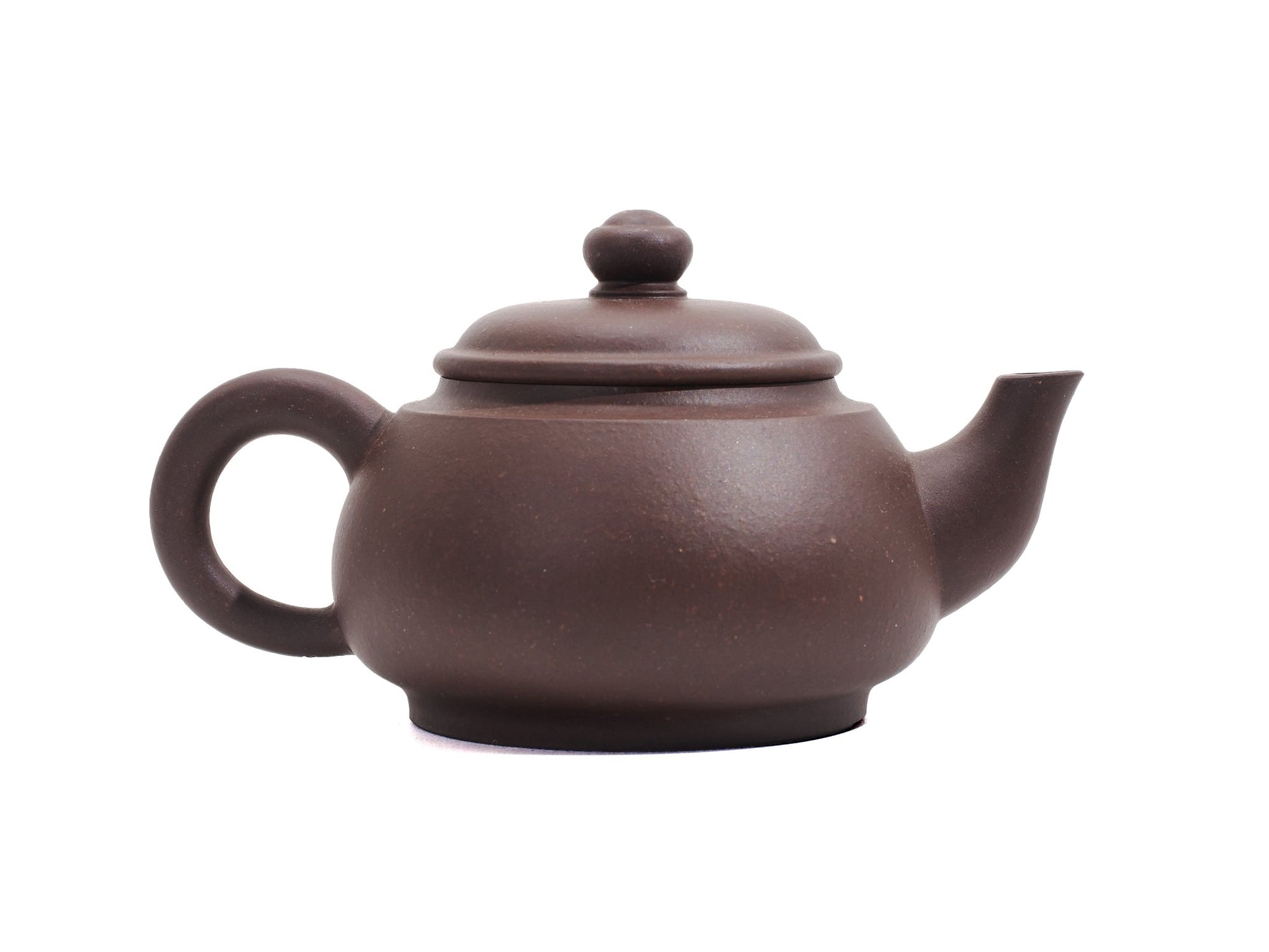 Handle side of Wu Yun Yixing teapot with traditional curve