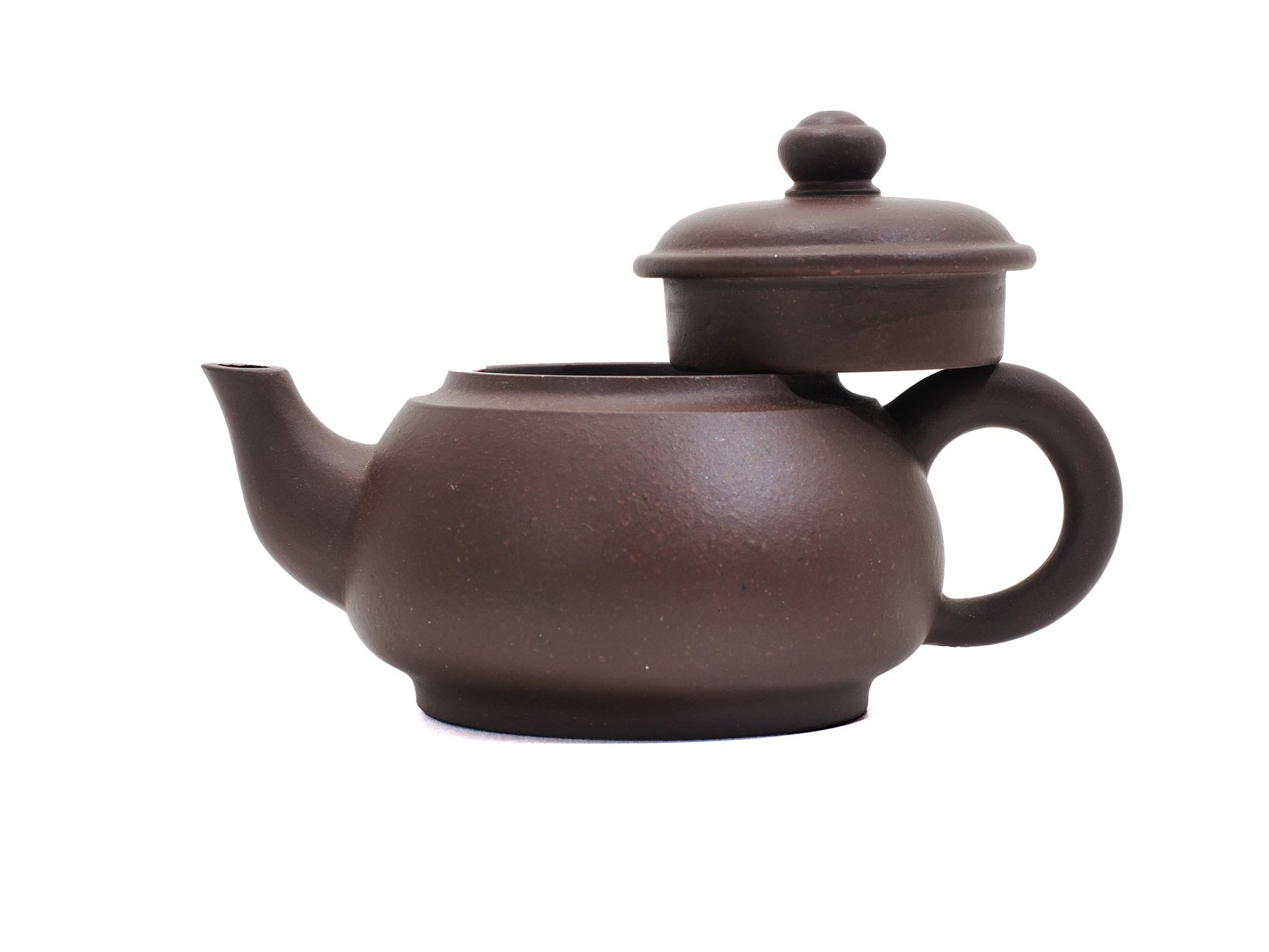 Wu Yun teapot with lid lifted, showcasing handcrafted build
