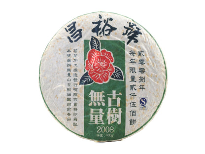 Front view of Cha Zhi Ji 2008 Wuliang Gushu Pu-erh Tea Cake with red camellia logo and traditional Chinese packaging