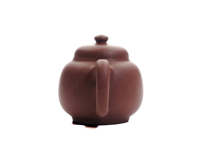 Back view of the Xiao Da Bin 50 ml diamond‑grade Yixing teapot showing the rounded handle and smooth purple clay finish.