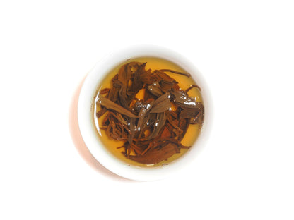 Steeping Yixing Gong Hong black tea leaves showing color and leaf shape