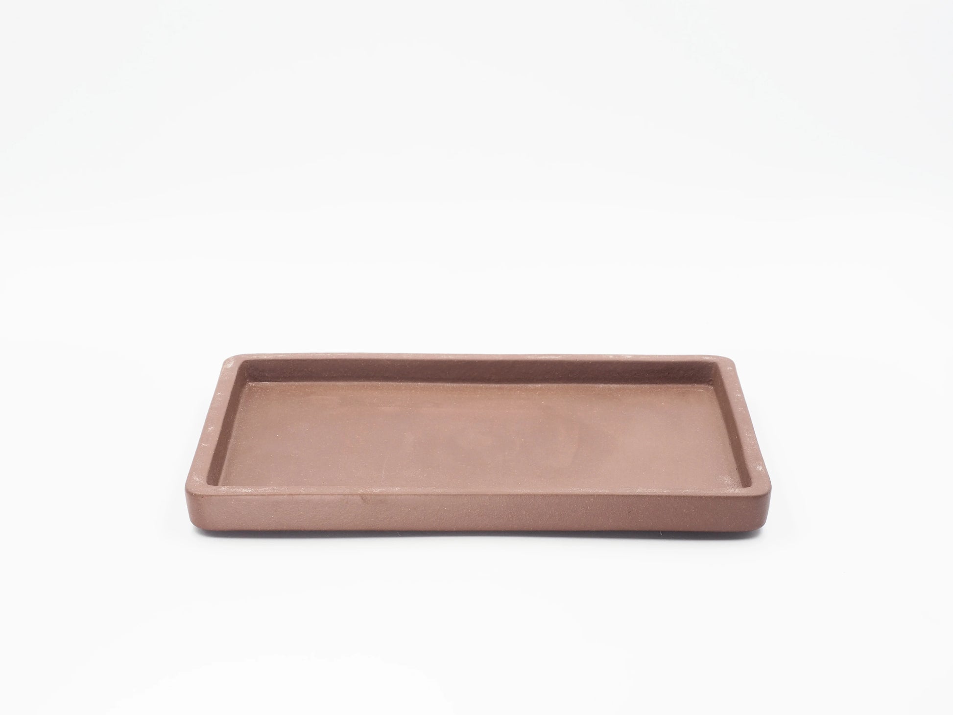 Handcrafted rectangular Yixing clay tea tray, a matte purple clay gongfu tea tray