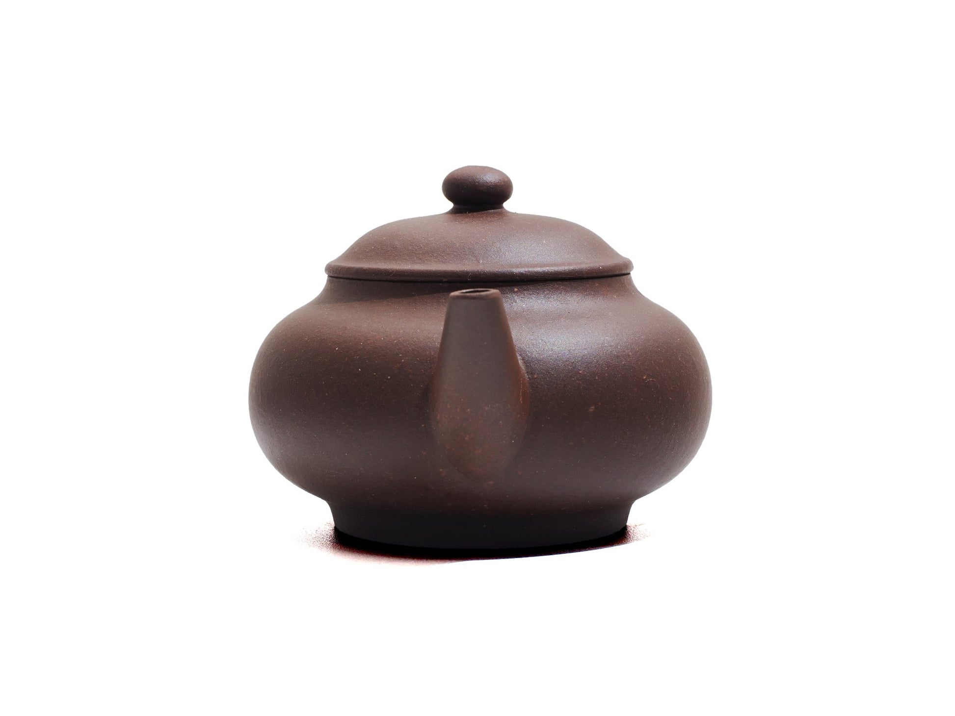 Front spout view of Cha Zhi Ji Junde Yixing teapot in bronze grade purple clay