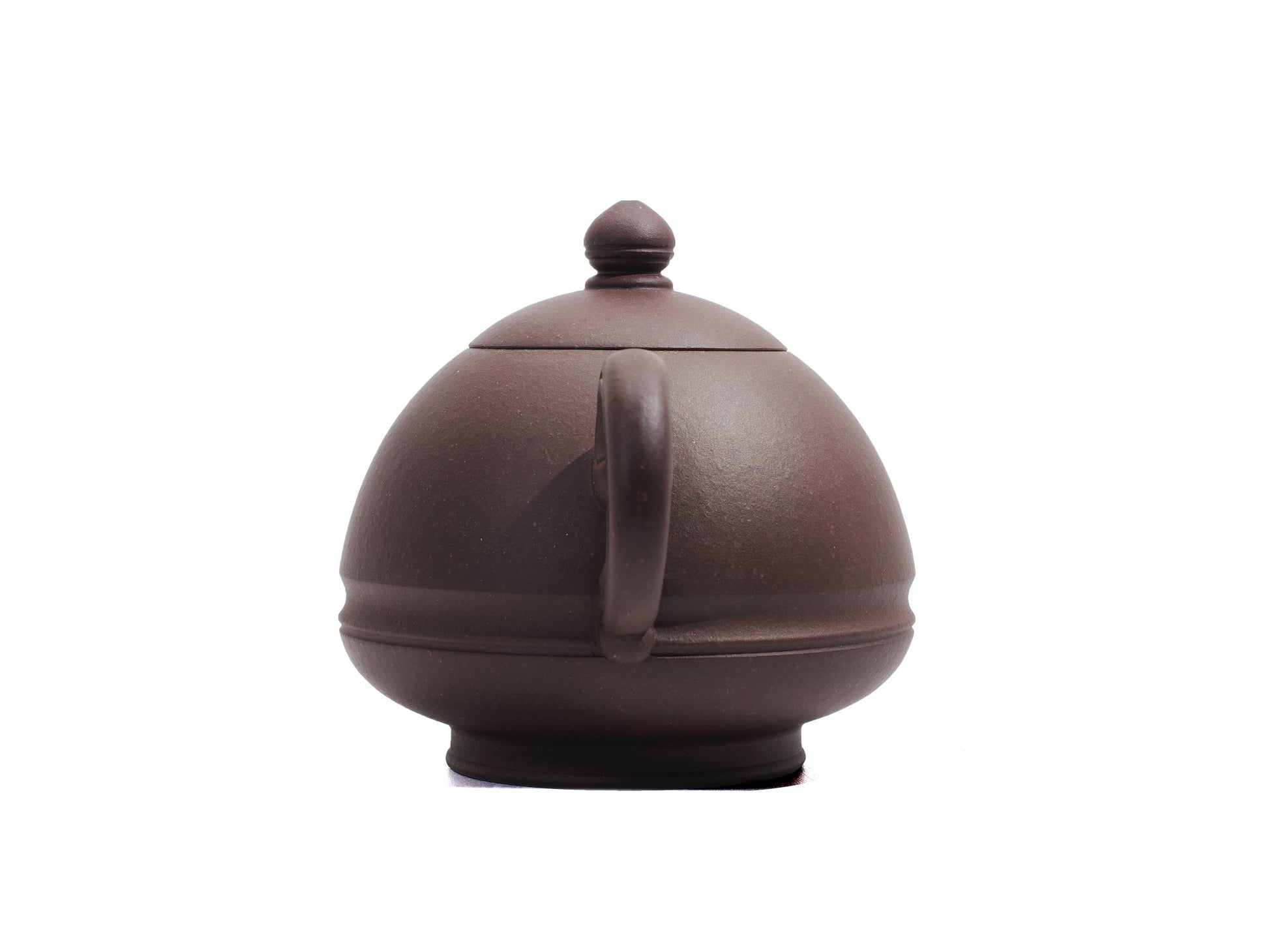 Back view of Yu Li Yixing teapot with refined body curvature