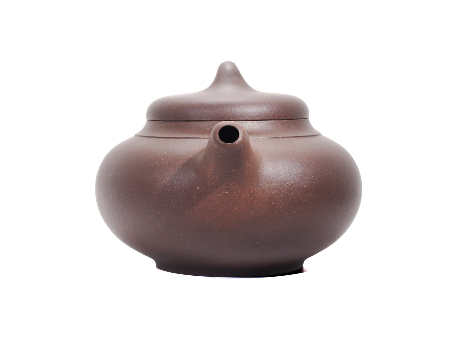 Front view of the Yun Tong Hu teapot showing the short spout and smooth, bulbous body.