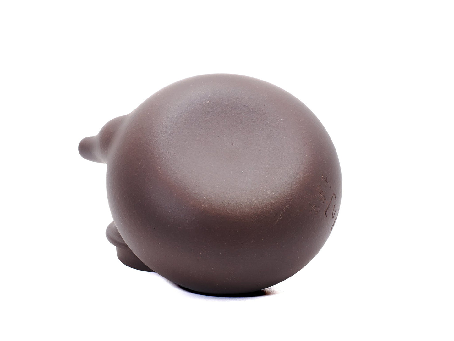 Bottom view of Zhu Shui Hu teapot showing base texture and finish