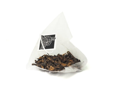 Loose leaves of premium whole black tea leaves in tea bags from Cha Zhi Ji