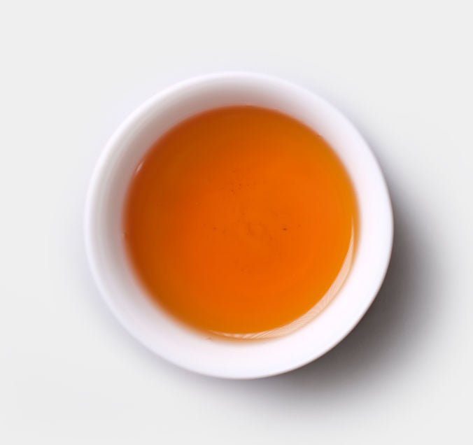 Tea soup of of Half-Handmade Rou Gui Wuyi Cliff Tea from Cha Zhi Ji