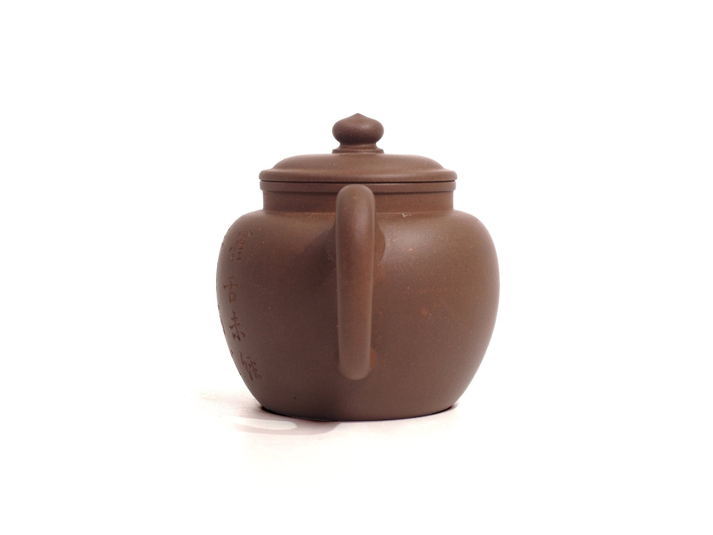 Handle view of Yixing Zisha Ju Lun Zhu Teapot with carving, 150ml, Raw Ore, from Cha Zhi Ji