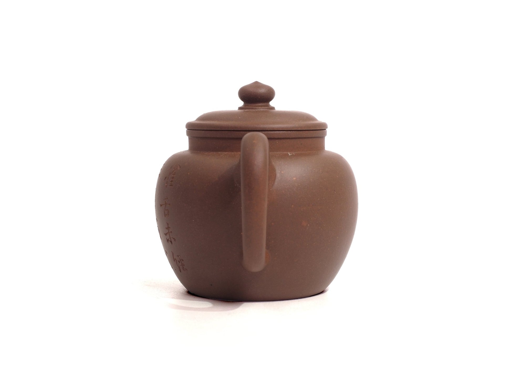 Handle view of Yixing Zisha Ju Lun Zhu Teapot with carving, 150ml, Raw Ore, from Cha Zhi Ji