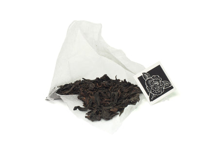 Loose leaves of premium Lao Cong Shui Xian whole tea leaves in tea bags from Cha Zhi Ji