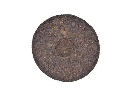Whole tea cake of Lao Shu Shou Pu-Erh tea from Cha Zhi Ji