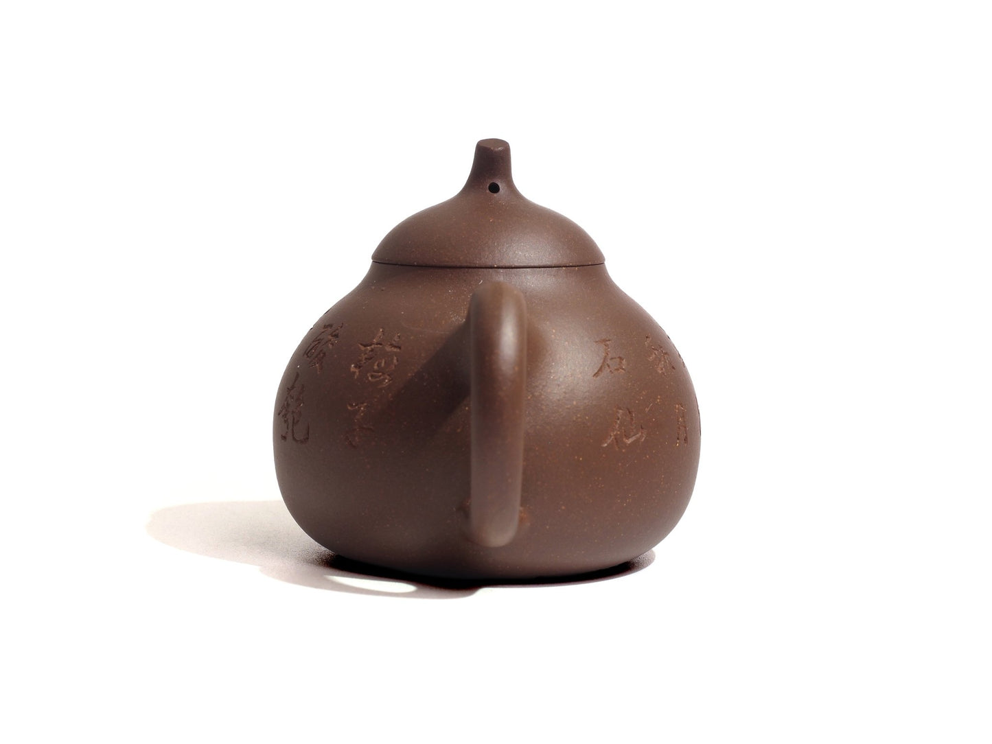 Handle view of Yixing Zisha Qie Duan Teapot with carving, 100ml, Raw Ore, from Cha Zhi Ji