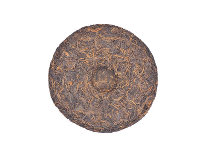 Whole tea cake of Zheng Ding Jia Zhai Sheng Pu-Erh tea from 2000 by Cha Zhi Ji