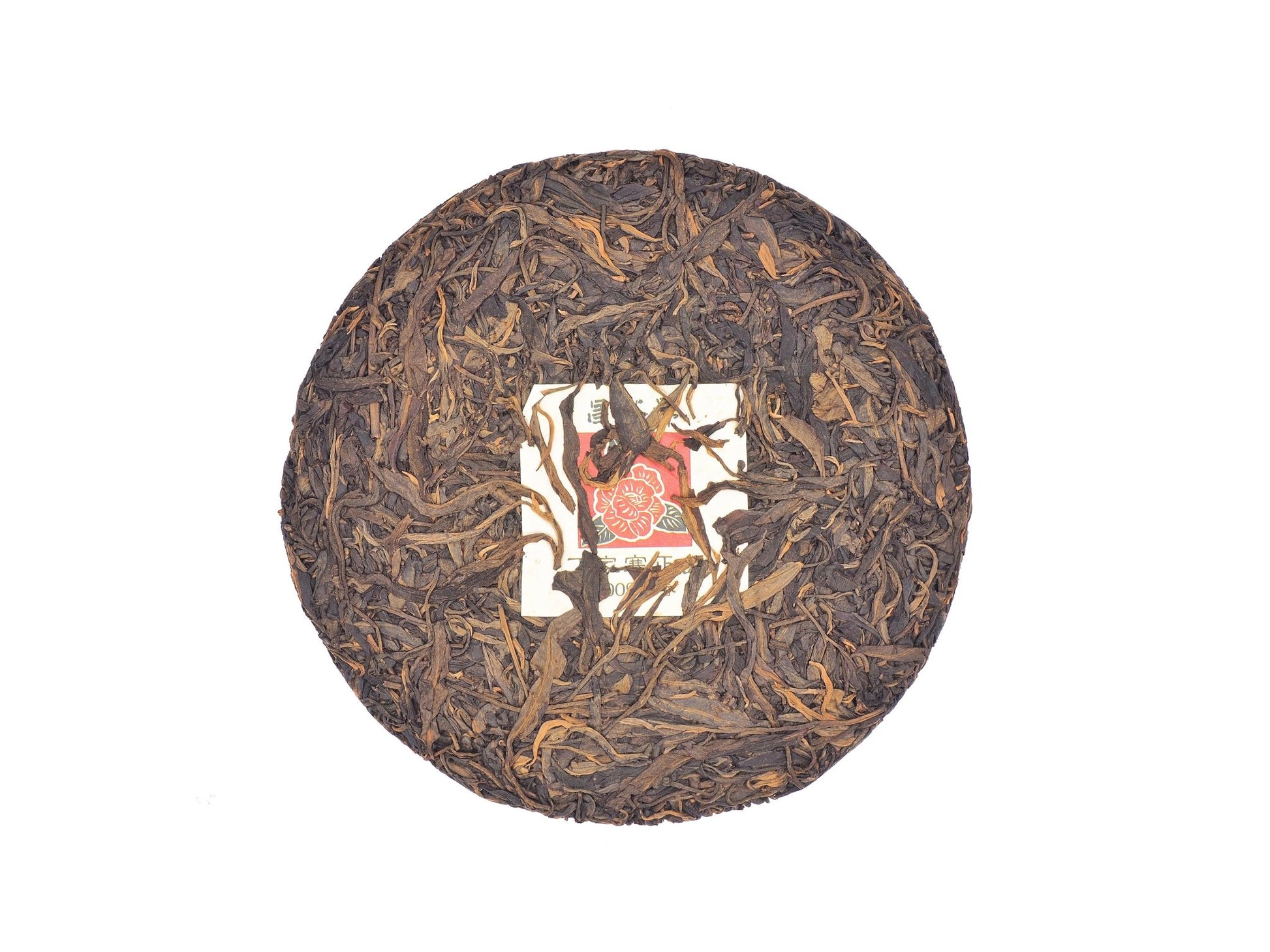 Whole tea cake of Zheng Ding Jia Zhai Sheng Pu-Erh tea from 2000 by Cha Zhi Ji