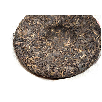 Whole tea cake of Zheng Gua Feng Zhai Sheng Pu-Erh tea from 2018 by Cha Zhi Ji